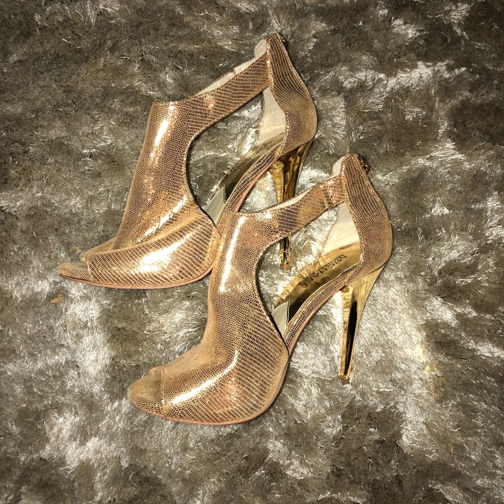 Michael Kors gold heels.